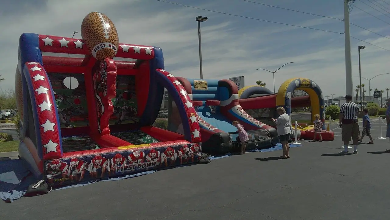 Raiders First Down Football Inflatable Obstacle Course Children Playing Event Production Las Vegas