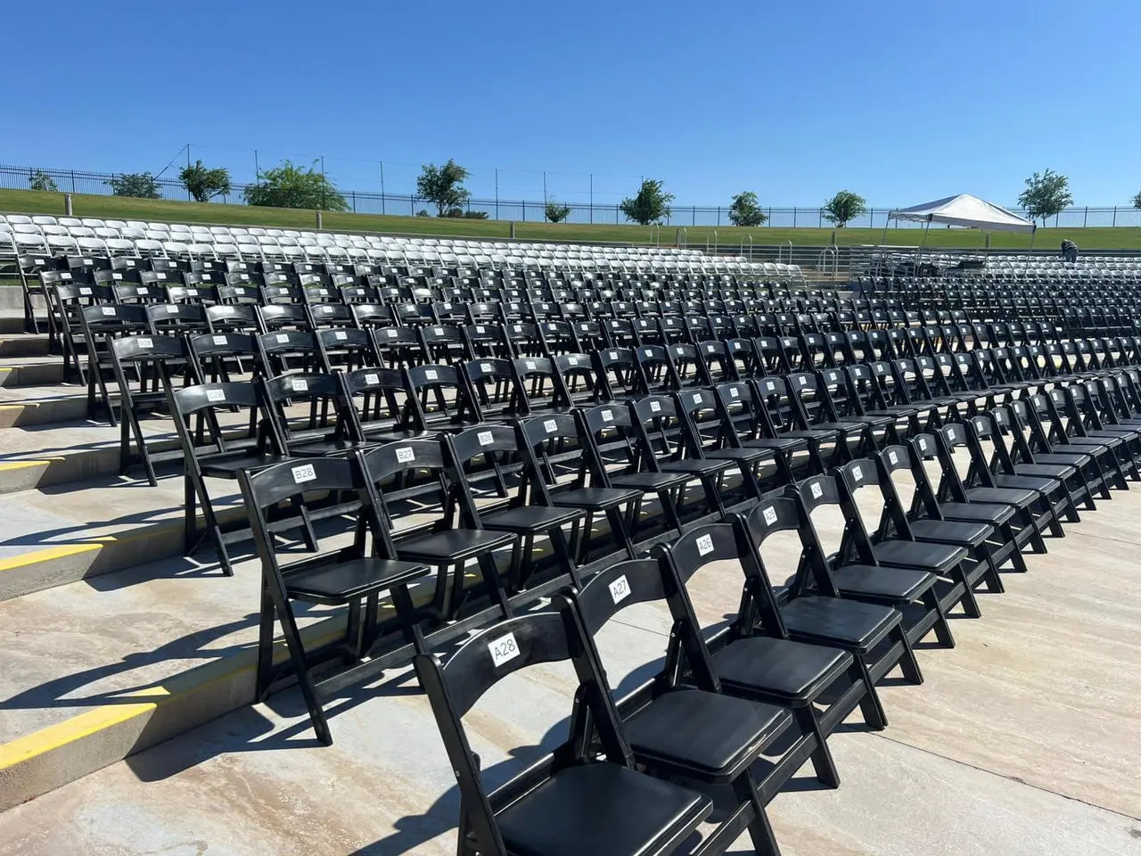 Outdoor event venue with rows of folding chairs for large-scale events in Las Vegas